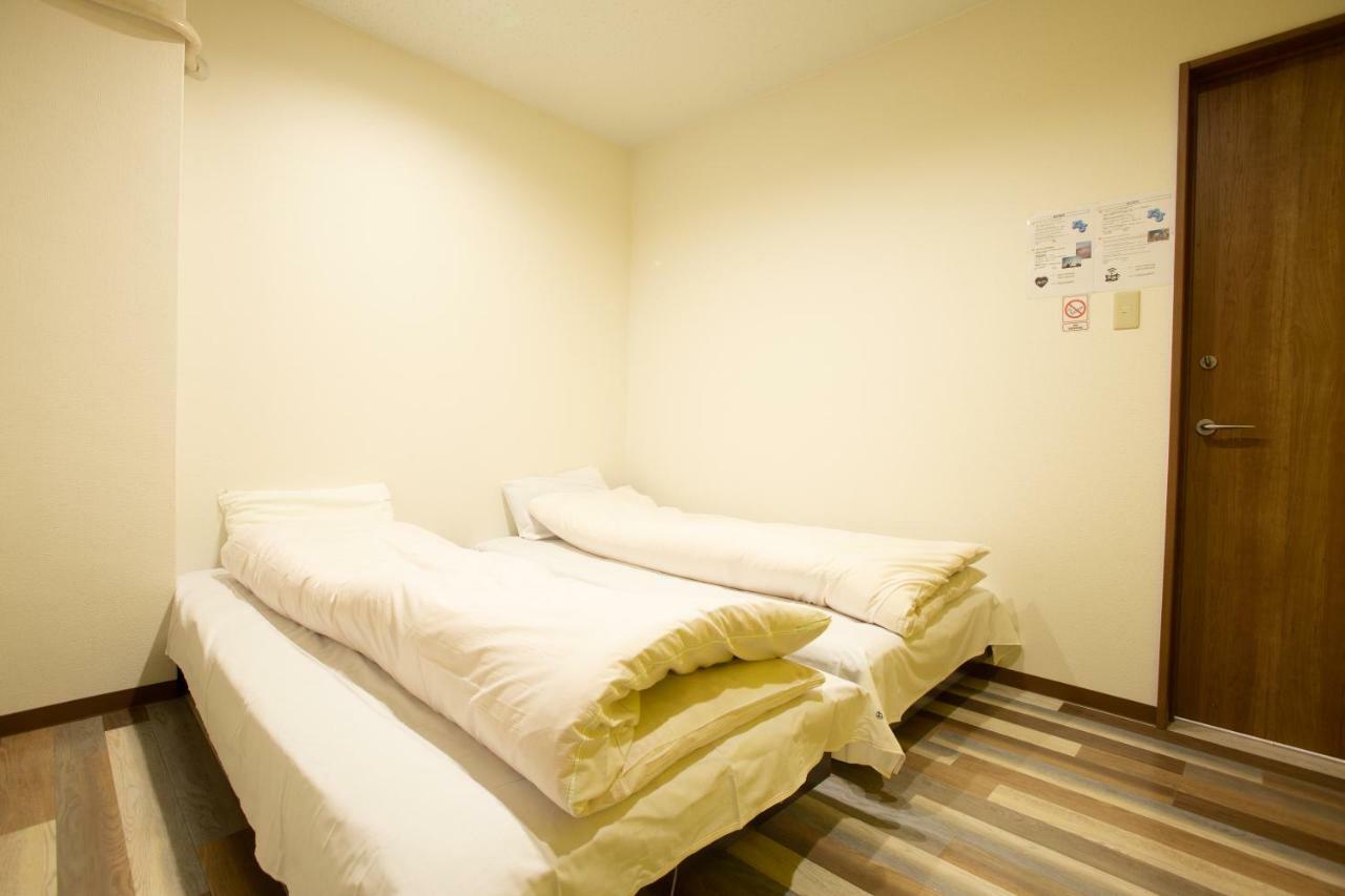 123 Guesthouse Osaka Bagian luar foto