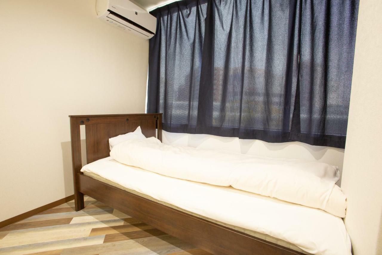 123 Guesthouse Osaka Bagian luar foto