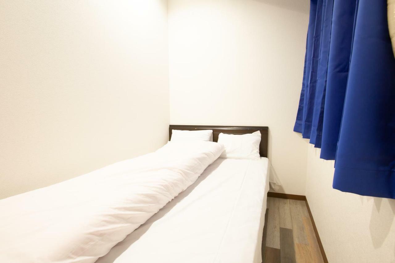 123 Guesthouse Osaka Bagian luar foto