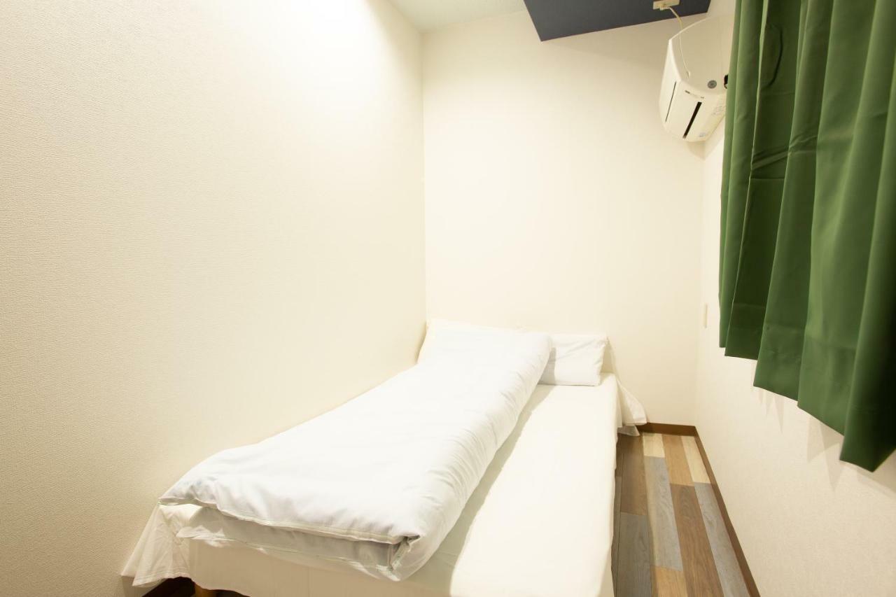 123 Guesthouse Osaka Bagian luar foto