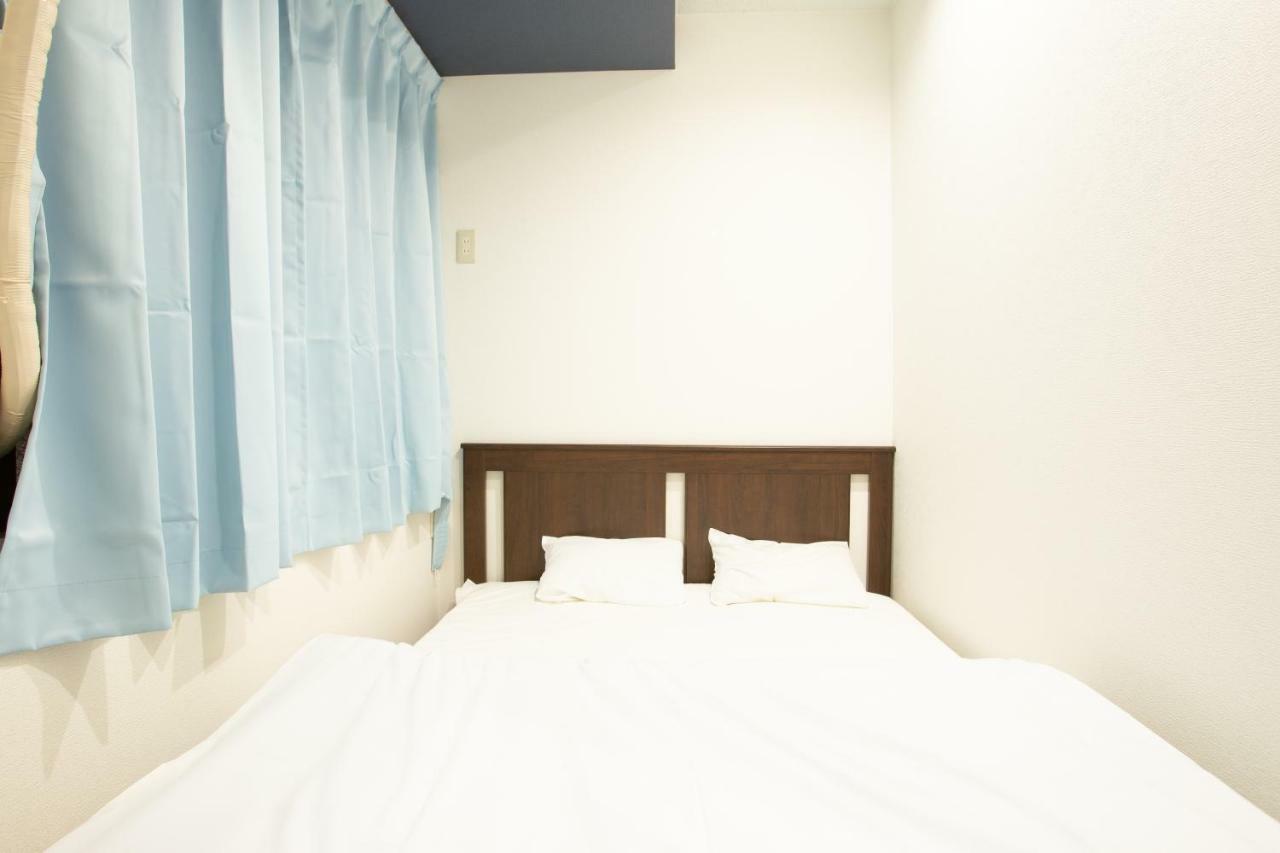 123 Guesthouse Osaka Bagian luar foto
