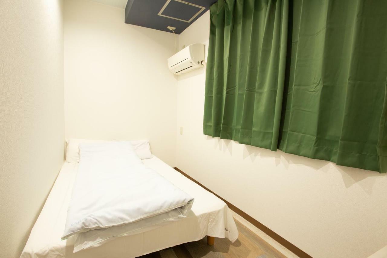 123 Guesthouse Osaka Bagian luar foto