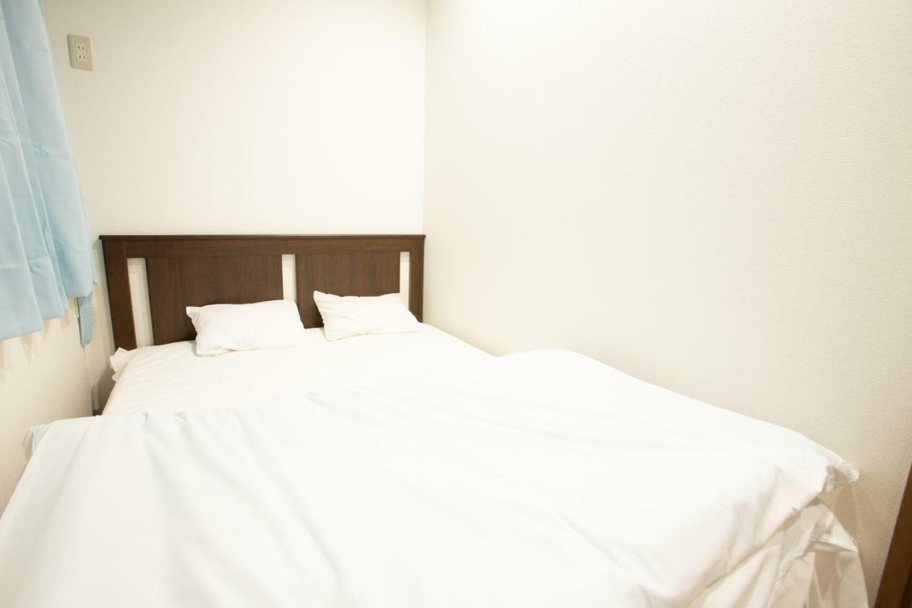 123 Guesthouse Osaka Bagian luar foto