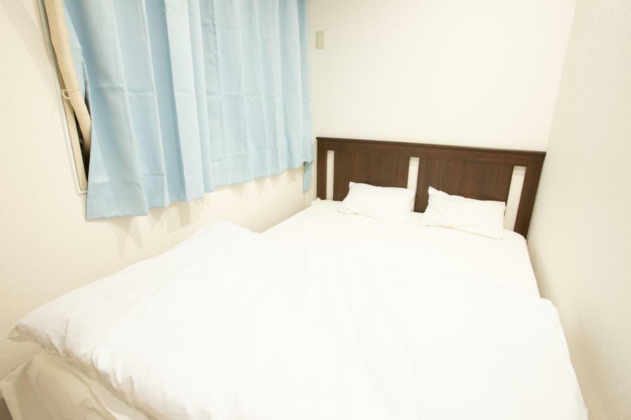 123 Guesthouse Osaka Bagian luar foto